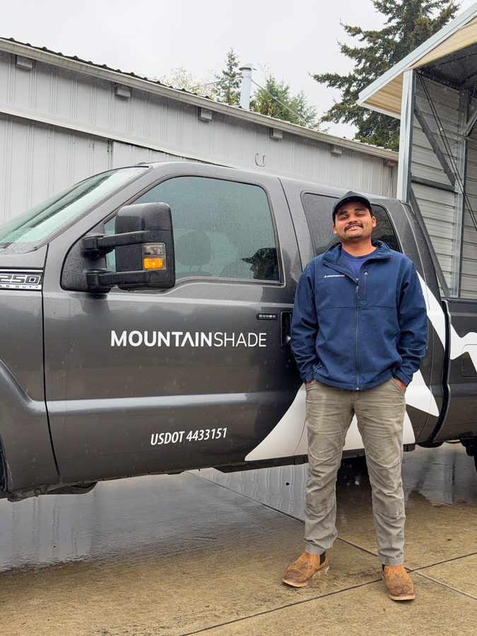 Darcy Koehn standing next to the Mountainshade truck